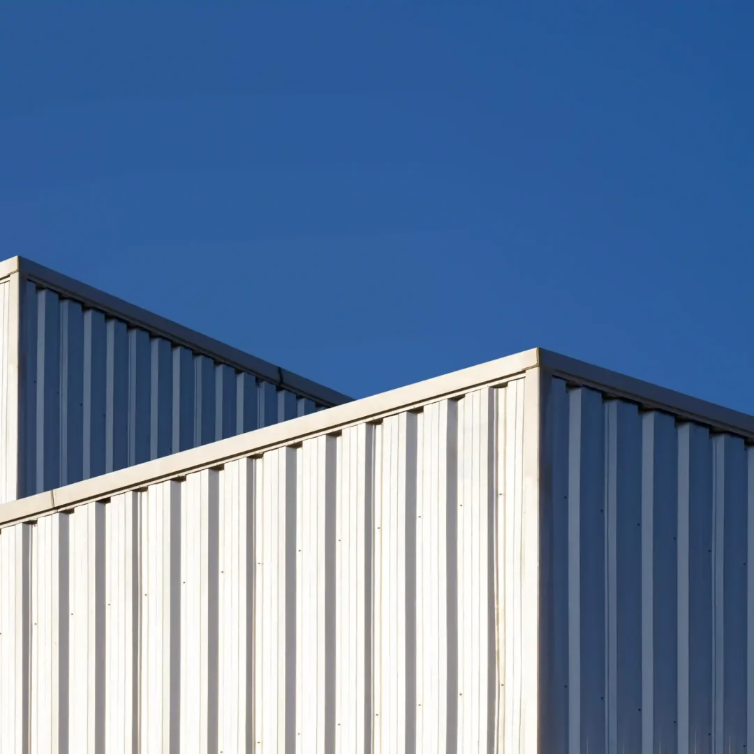 two commercial steel garage buildings from top